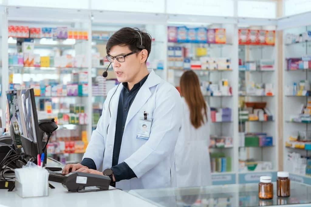 A friendly account manager or customer success representative on a video call, headset, or phone — engaged, supportive, and clearly helping a client.